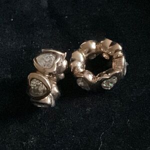 Pair of Pandora rose gold spacer with heart shape stones